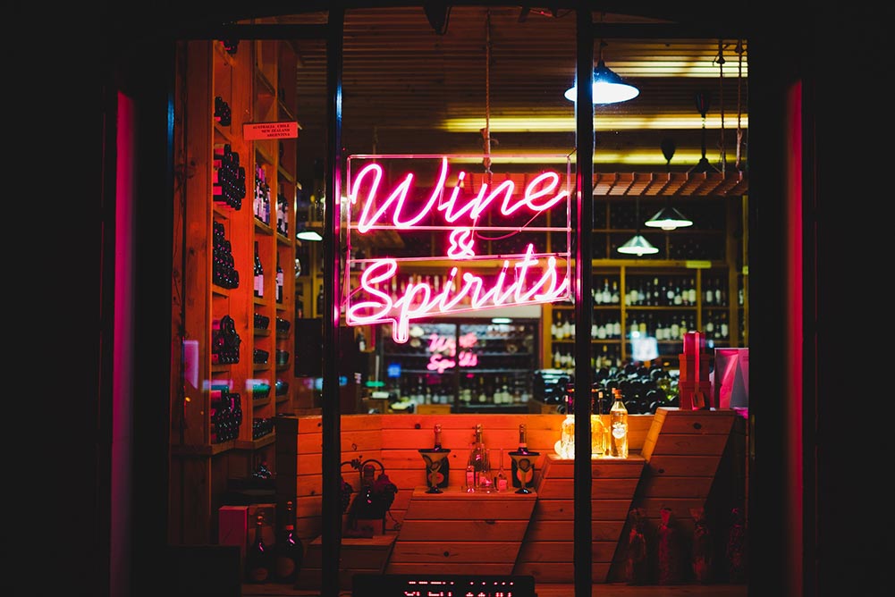 Neon sign reading Wine and Spirits