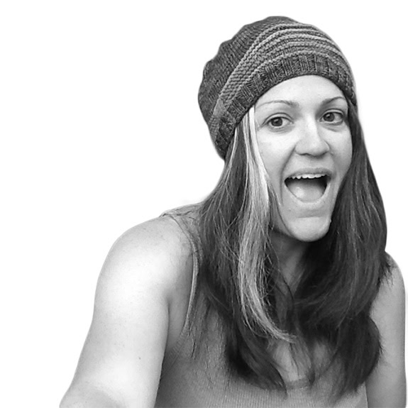 bio picture of polly hammond wearing beanie and smiling at camera