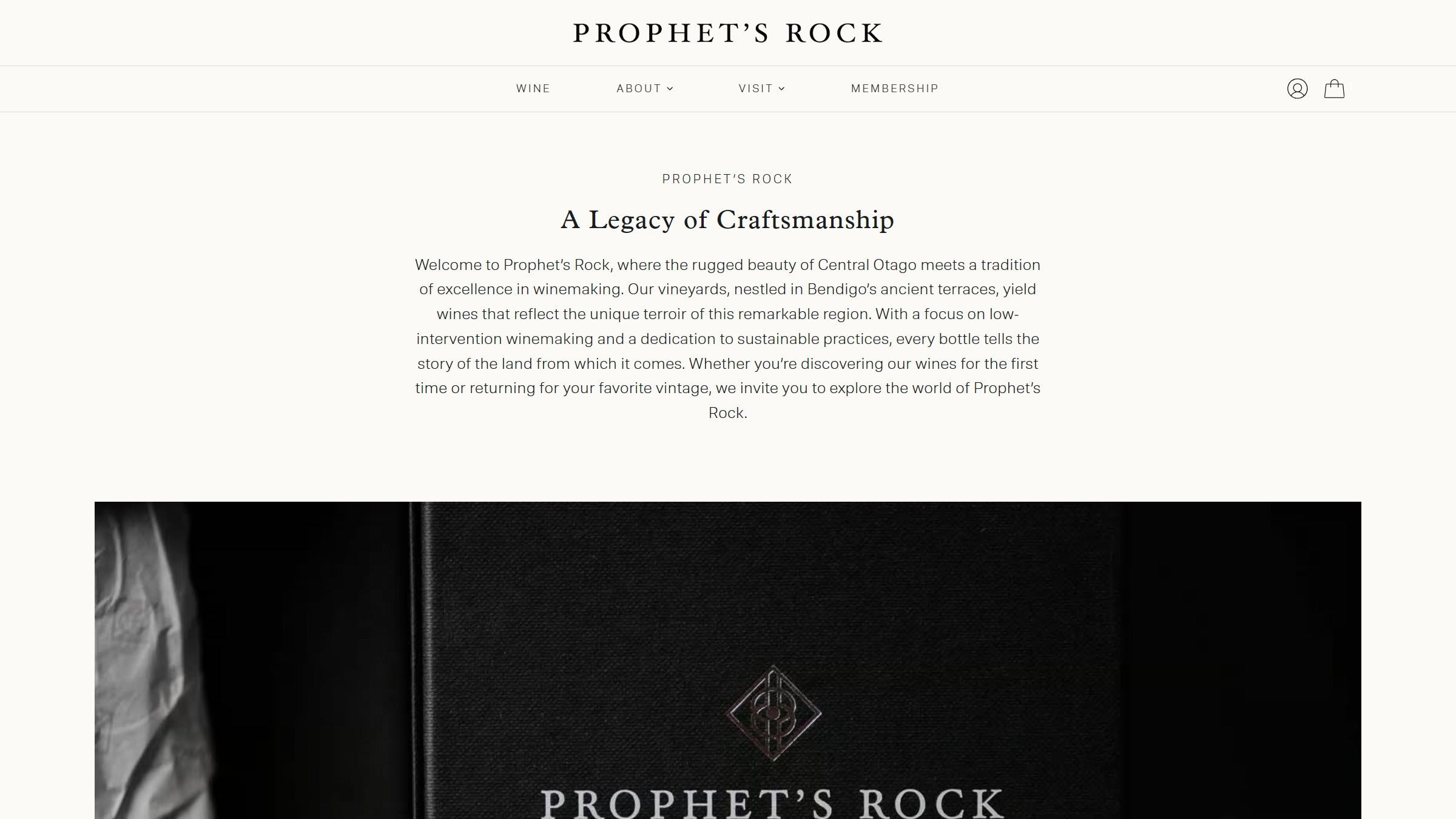 Screenshot of Prophet's Rock Wine home page with light neutral background, dark high quality imagery, and neoclassical design