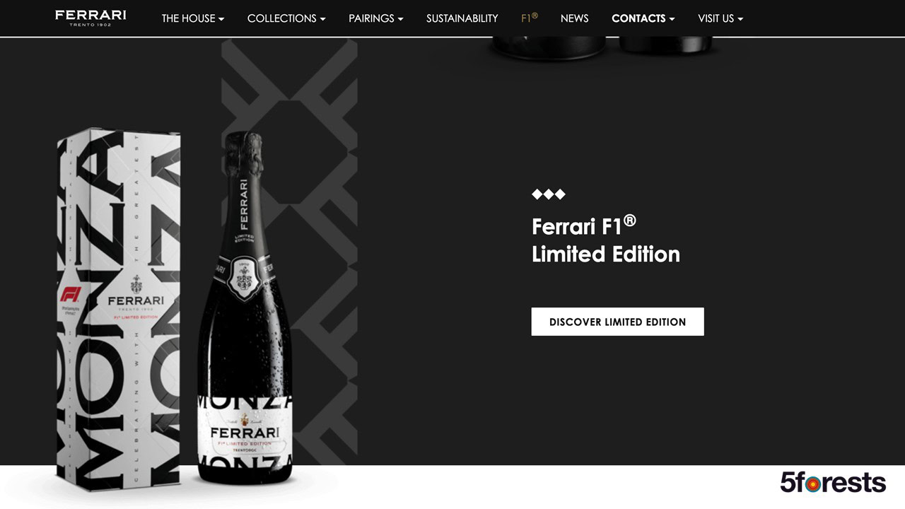 A Ferrari F1 Limited Edition wine bottle and matching box labeled "Monza" are displayed on a black background, with text inviting users to discover the limited edition. Ferrari Trentodoc and 5forests logos are visible.