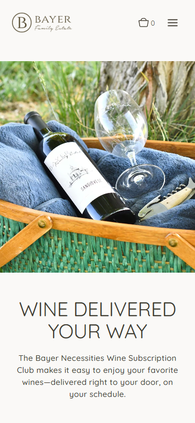 The Bayer Family Estate wine club page on a phone, headed "Wine Delivered Your Way", with the bottle and glass in a wooden tray above the subscription copy.