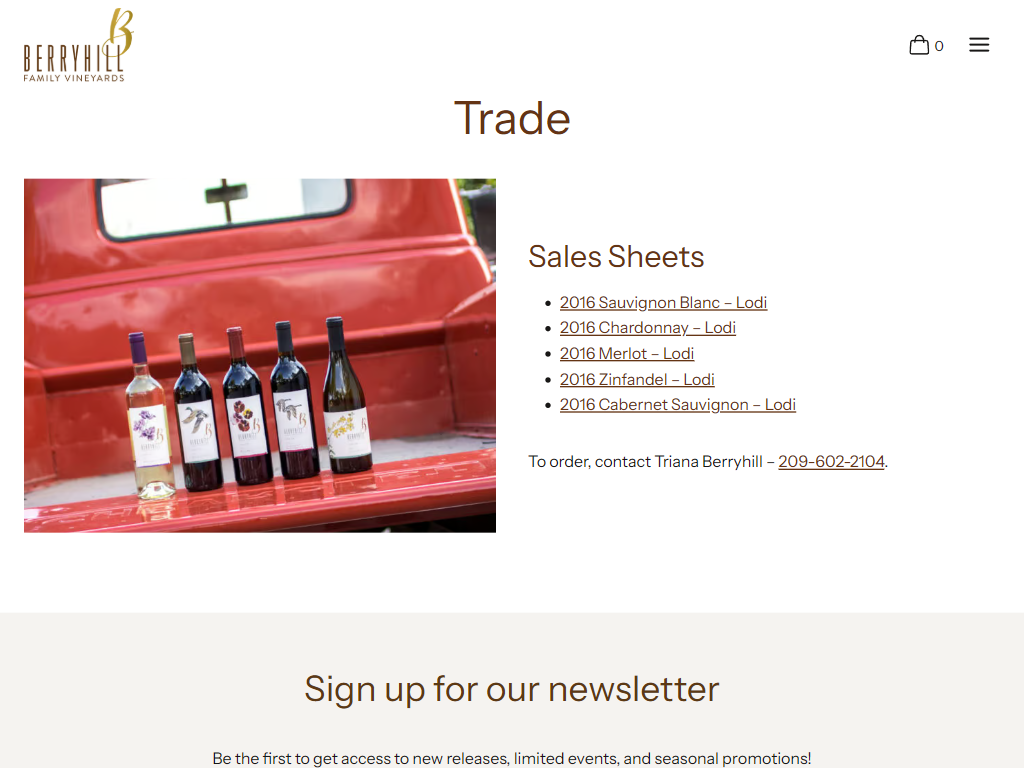 The Berryhill trade page in a desktop browser, headed "Trade", with bottles lined up on the tailgate of a red pickup beside a list of downloadable sales sheets.