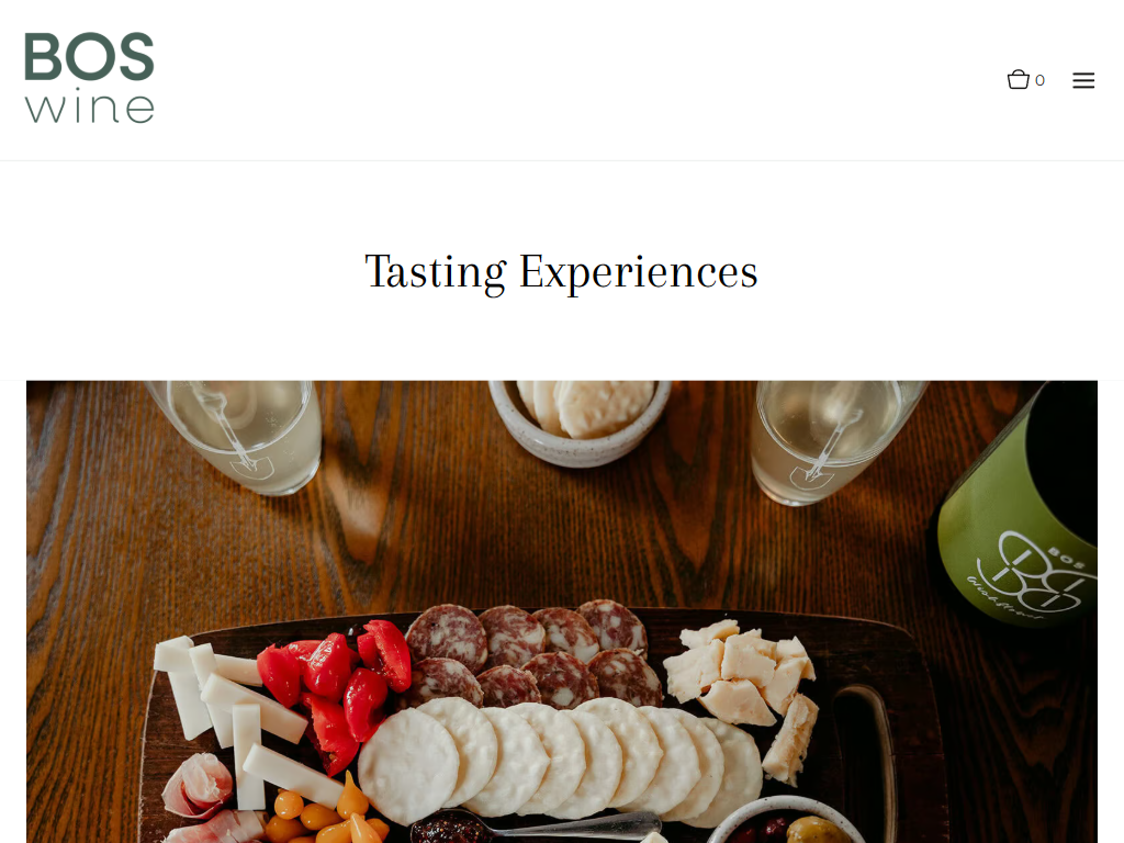 The Bos Wine tasting experiences page in a desktop browser, headed "Tasting Experiences", with a charcuterie board and glasses of white wine on a table.