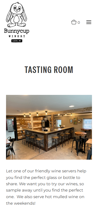 The Bunnycup tasting room page on a phone, headed "Tasting Room", with the timber interior above a note about sampling the wines.