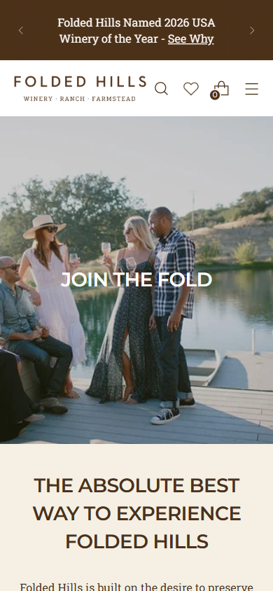 The Folded Hills membership page on a phone, headed "Join the Fold", with guests gathered by the water above the invitation to join.