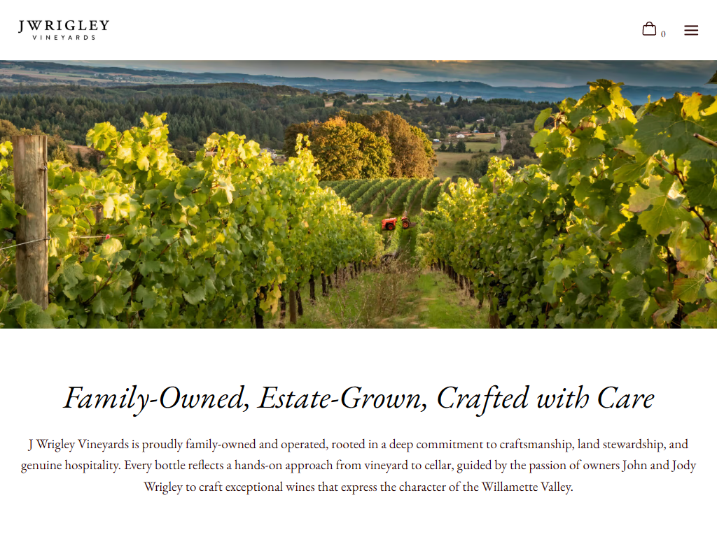 The J Wrigley story page in a desktop browser, with the hillside vineyard above the heading "Family-Owned, Estate-Grown, Crafted with Care".
