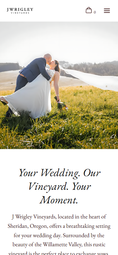 The J Wrigley weddings page on a phone, with the couple in the meadow above the line "Your Wedding. Our Vineyard. Your Moment."