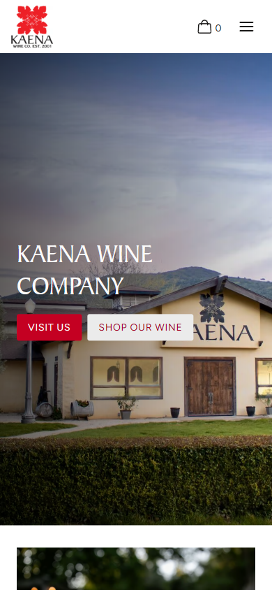 The Kaena homepage on a phone, with the tasting room building behind the winery name and the visit and shop buttons.