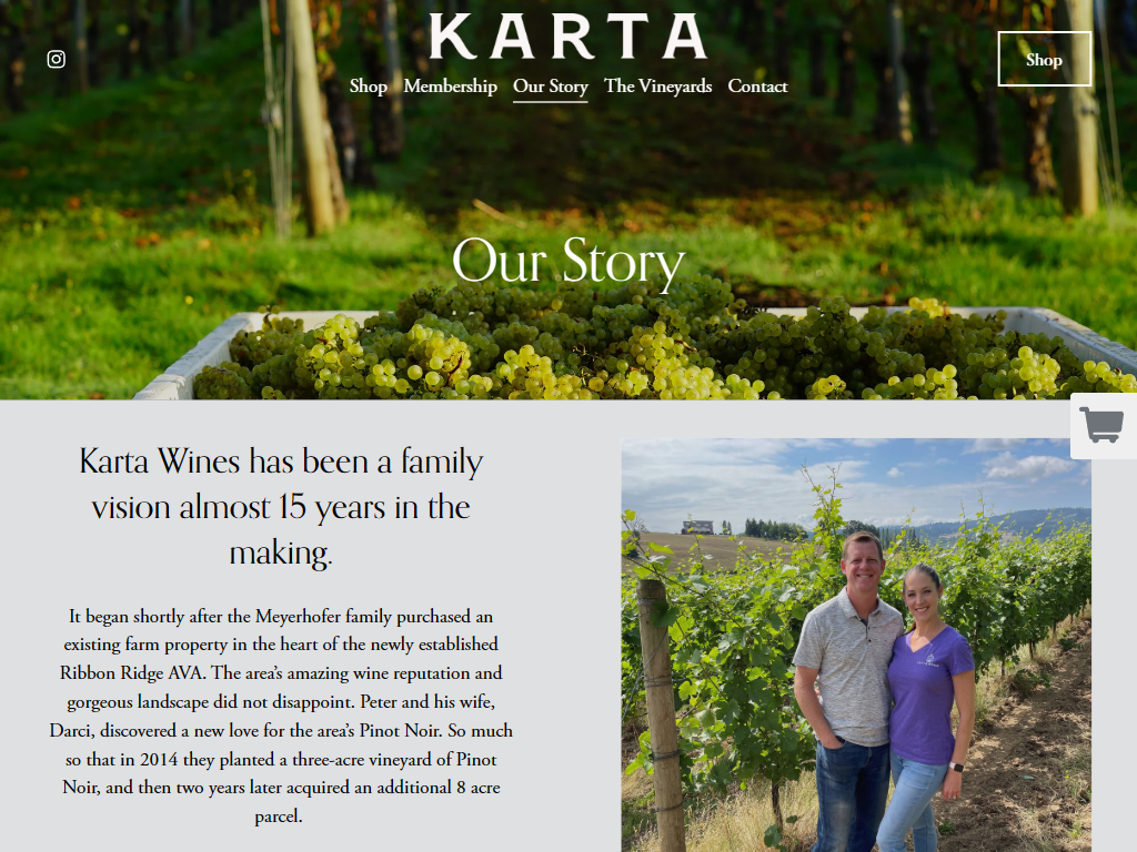The Karta story page in a desktop browser, headed "Our Story" over bins of freshly picked white grapes, with the founders photographed in the vineyard beside the family's history.