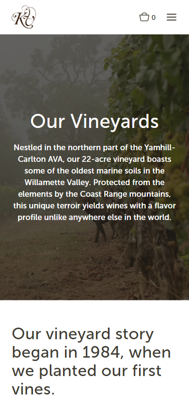 The Kramer vineyards page on a phone, headed "Our Vineyards", with the line about planting the first vines in 1984.