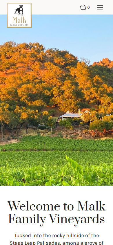 The Malk Family homepage on a phone, with the autumn trees above the vineyard and the welcome heading.