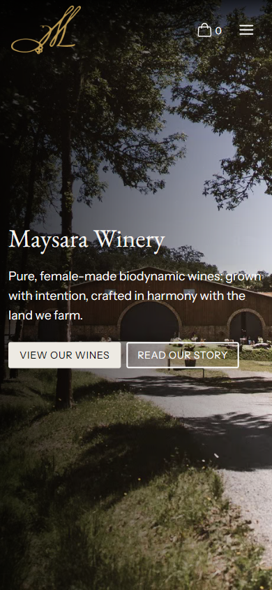 The Maysara homepage on a phone, with the winery name and the biodynamic wines line over the tree-lined drive.