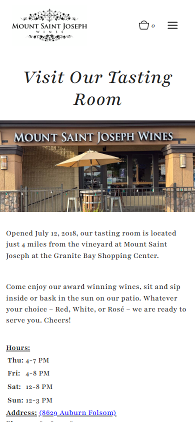 The Mount Saint Joseph tasting room page on a phone, headed "Visit Our Tasting Room", with the shopfront photograph above the opening hours and address.