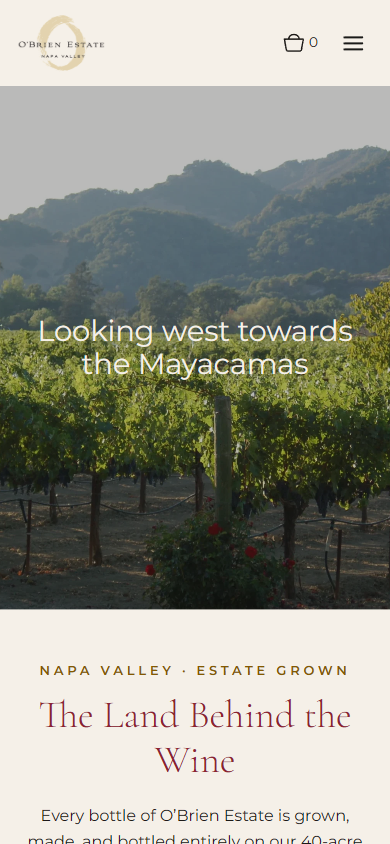 The O'Brien Estate vineyards page on a phone, with a view west toward the Mayacamas above the heading "The Land Behind the Wine".