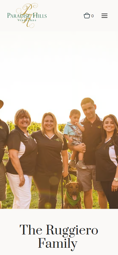 The Paradise Hills family page on a phone, with the group photograph above the heading naming the Ruggiero family.