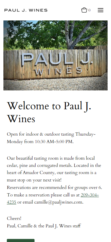 The Paul J. Wines homepage on a phone, with the fence sign photograph above the heading "Welcome to Paul J. Wines" and the tasting room hours.