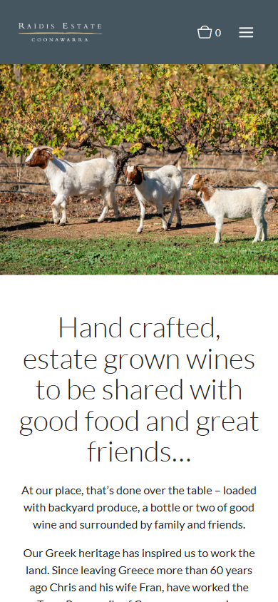 The Raidis Estate homepage on a phone, with the goats in the vineyard above the line about hand crafted, estate grown wines.