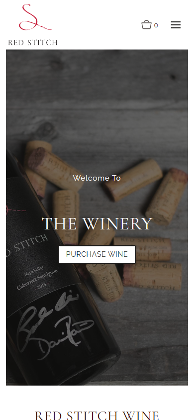 The Red Stitch homepage on a phone, with the bottle and corks behind the heading "The Winery" and a purchase button.