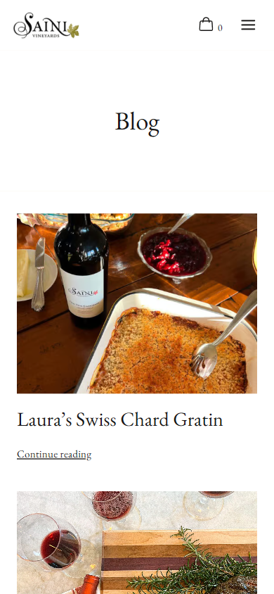 The Saini blog on a phone, headed "Blog", with a recipe post for Swiss chard gratin photographed with a bottle alongside.