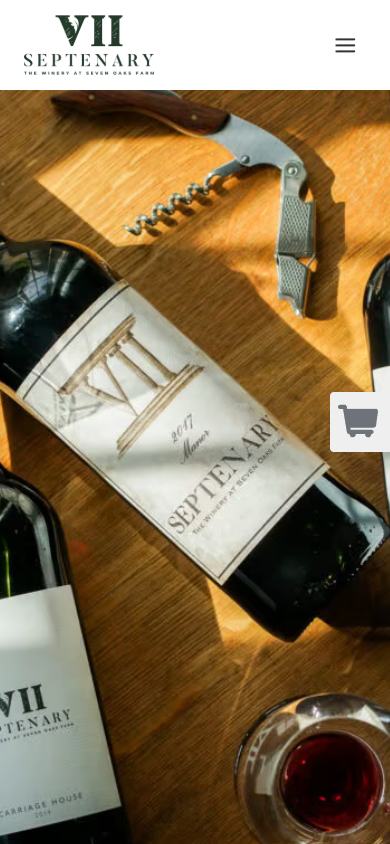 The Septenary Winery wine club page on a phone, showing a bottle, a corkscrew and a filled glass arranged on a wooden table.