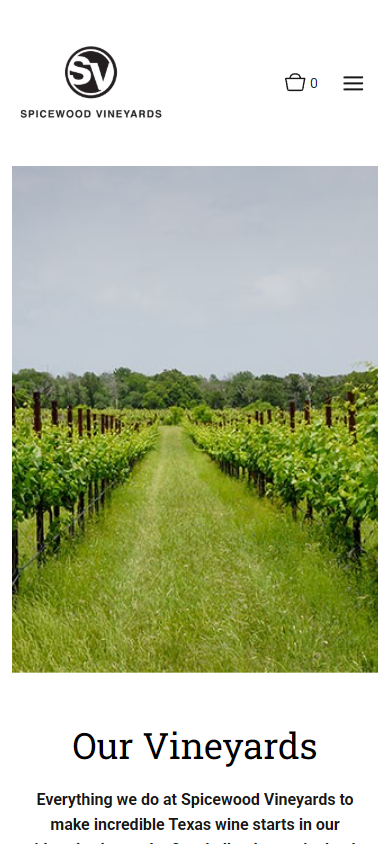 The Spicewood Vineyards vineyards page on a phone, with a green row of vines above the heading "Our Vineyards" and a note that everything the winery does starts in the vineyard.