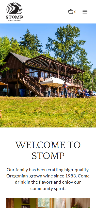 The Stomp homepage on a phone, with the winery building and lawn above the heading "Welcome to Stomp".