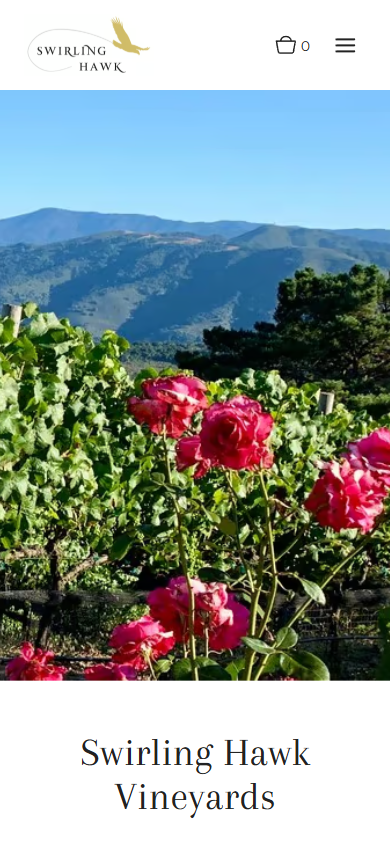 The Swirling Hawk homepage on a phone, with the roses and vines photograph above the winery name.