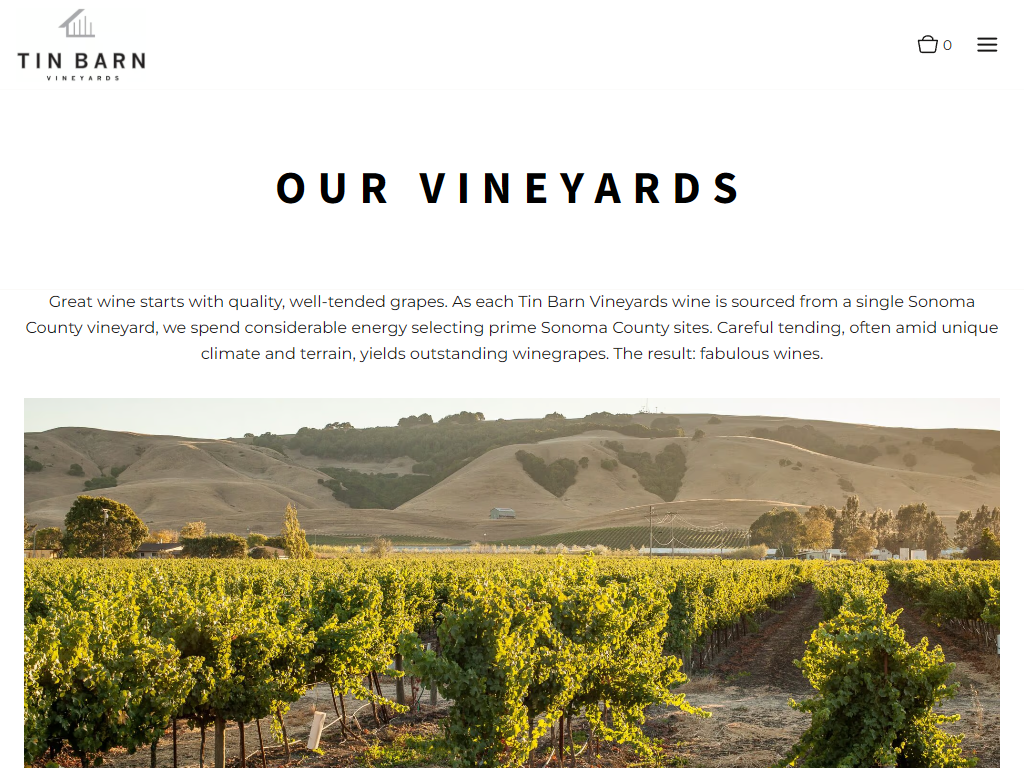 The Tin Barn vineyards page in a desktop browser, headed "Our Vineyards", with an autumn vineyard running back to the Sonoma hills.