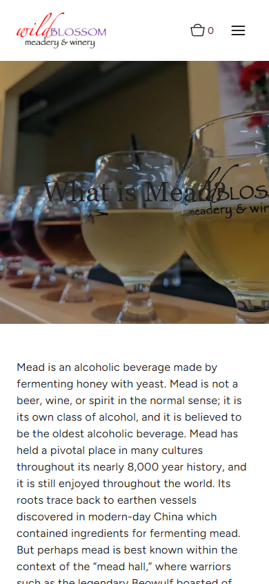 The Wild Blossom "What Is Mead?" page on a phone, with the glasses of mead above the explanation of how mead is made.