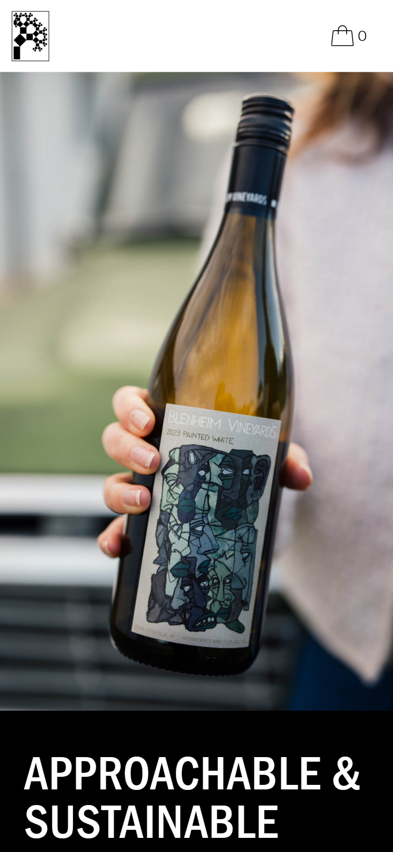 The Blenheim Vineyards home page on a phone: the hand-held bottle of white wine above the headline "Approachable & Sustainable".