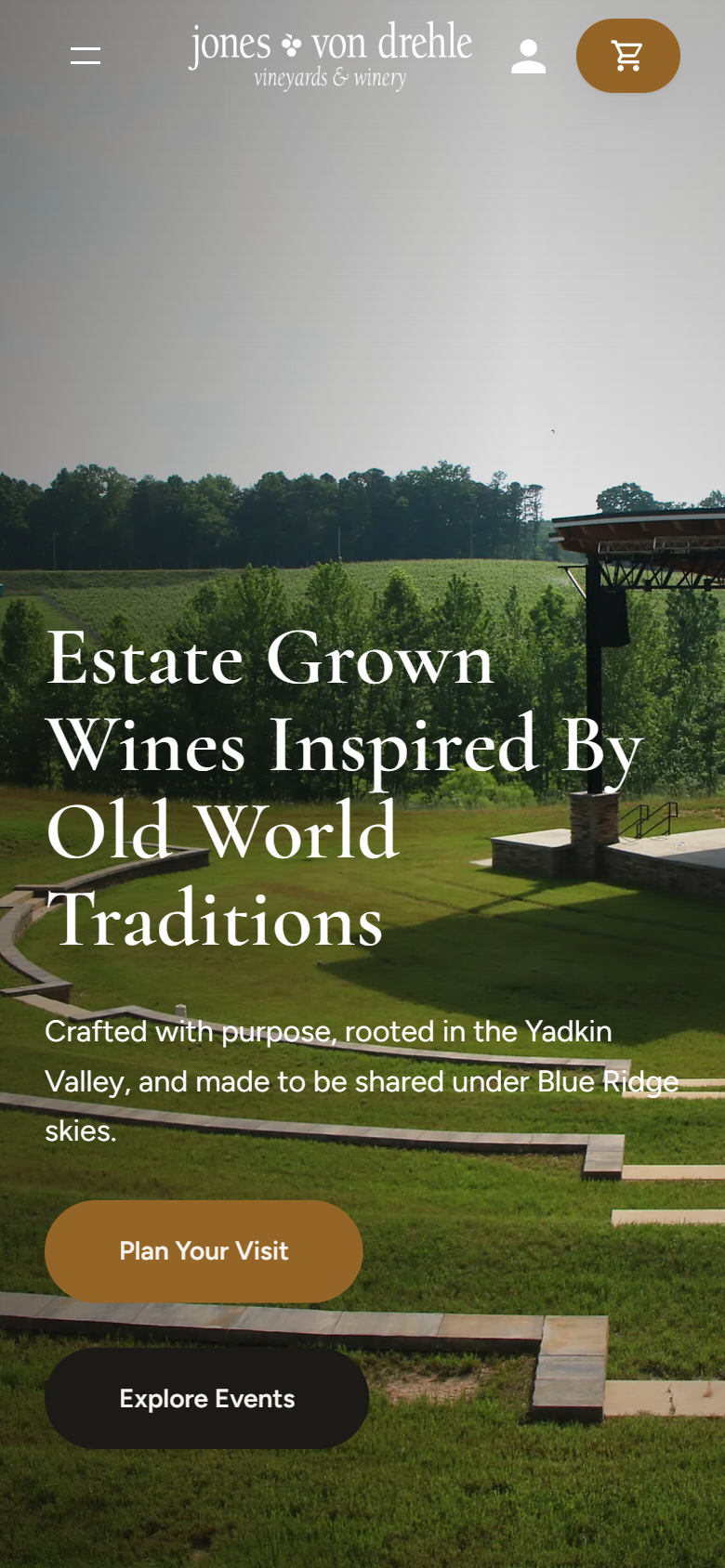 The Jones von Drehle home page on a phone: the estate amphitheater under the Old World Traditions headline, with Plan Your Visit and Explore Events buttons.