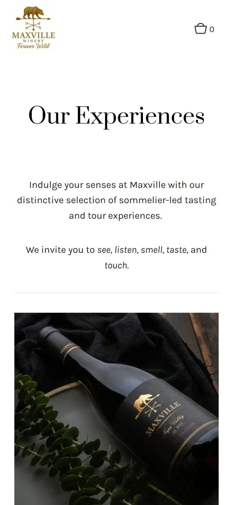 The Our Experiences page on a phone, inviting visitors to see, listen, smell, taste and touch, above a bottle photographed among leaves.