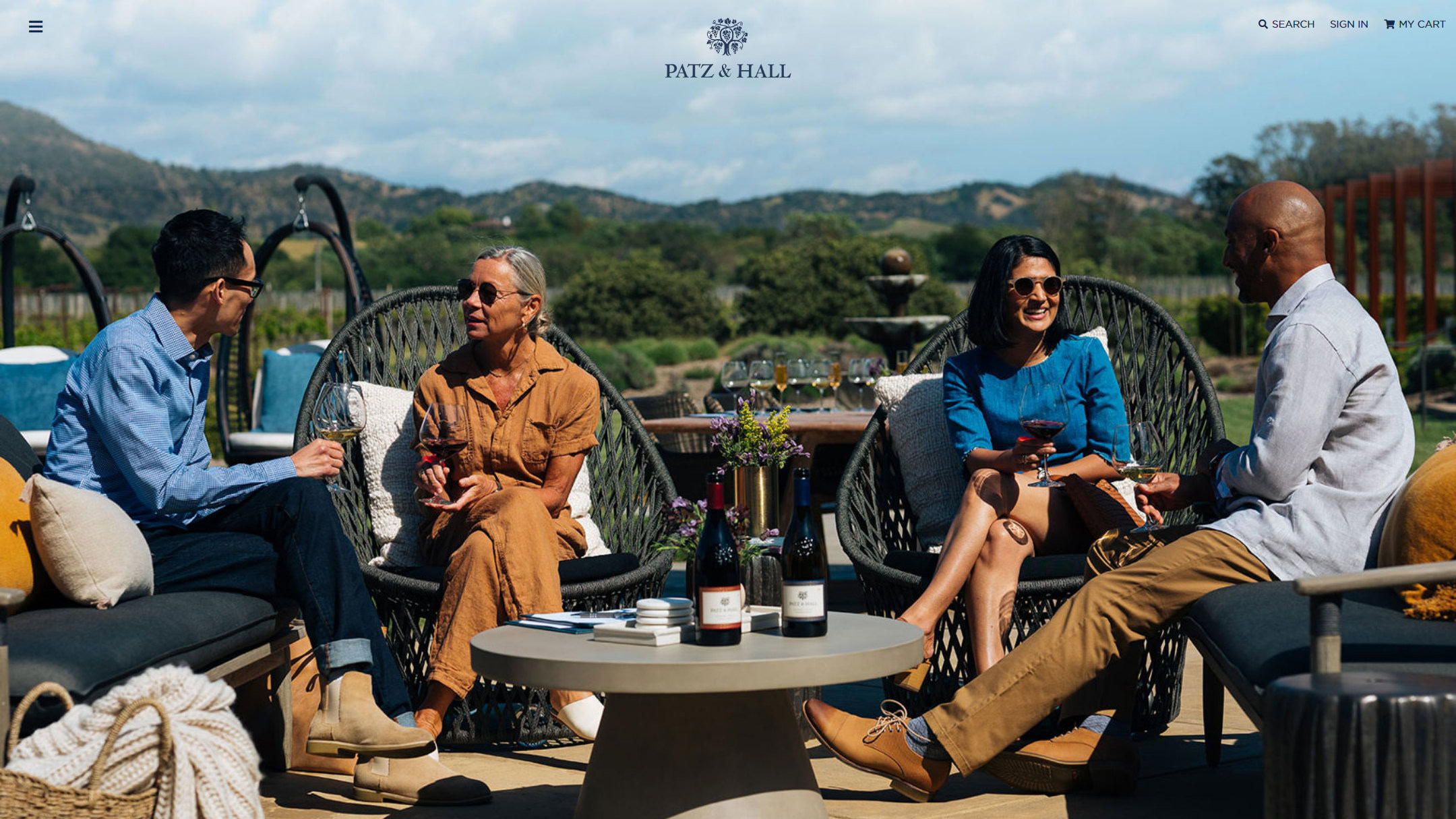 The Patz & Hall home page in 2024, on the Ste. Michelle site: guests tasting on a terrace