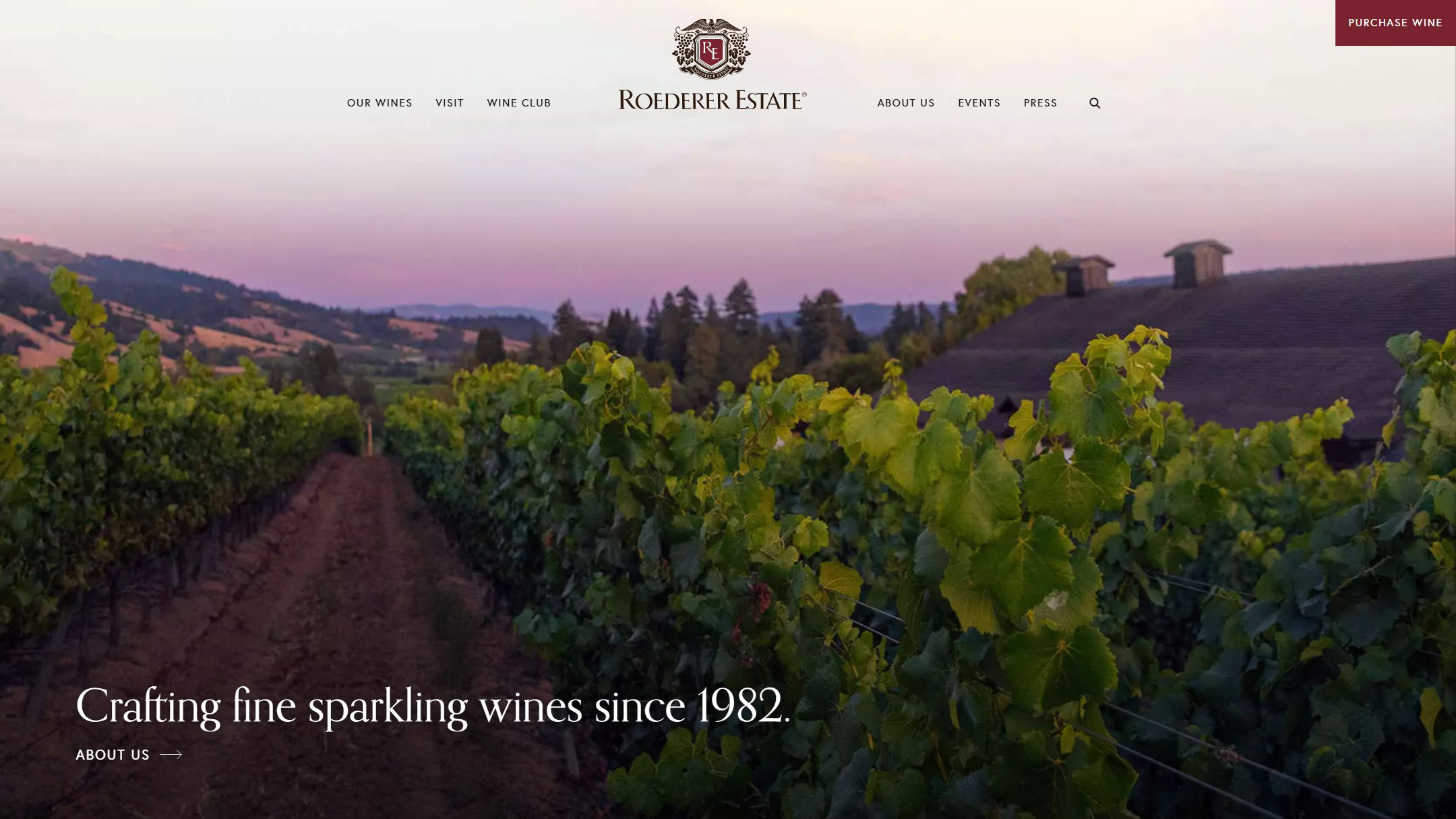 The Roederer Estate home page in early 2025, before the new site: Crafting fine sparkling wines since 1982, over the vineyard at dusk