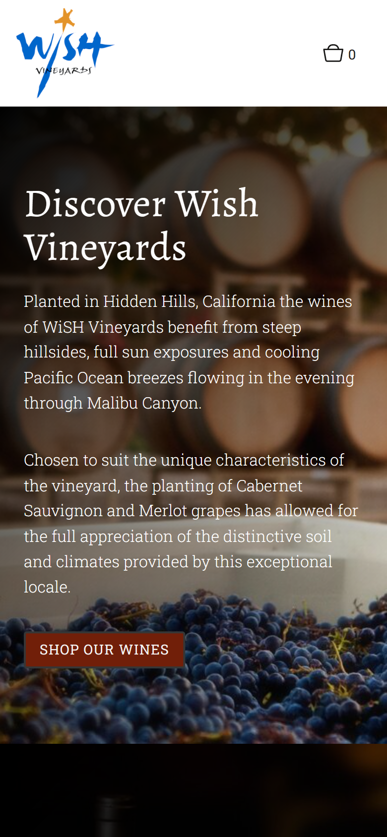 The Wish Vineyards home page on a phone: the grapes and barrels behind "Discover Wish Vineyards" and an introduction to the Hidden Hills estate.